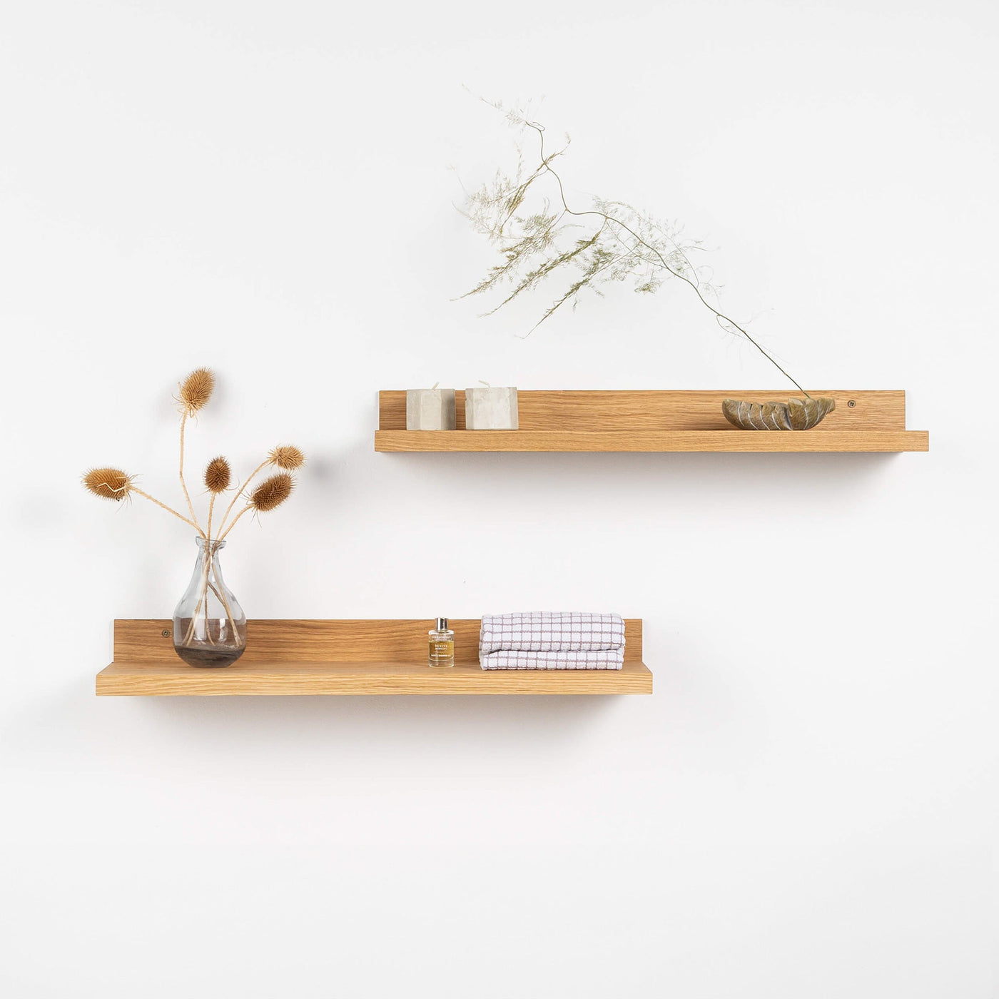 Set of two natural oak floating wall shelves for home decor and storage