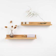 Set of two natural oak floating wall shelves for home decor and storage