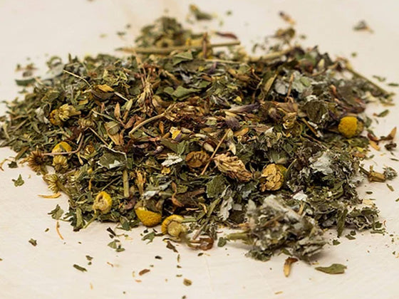 Organic fertility support herbal tea with red raspberry leaf, red clover, nettle, spearmint, alfalfa, and chamomile